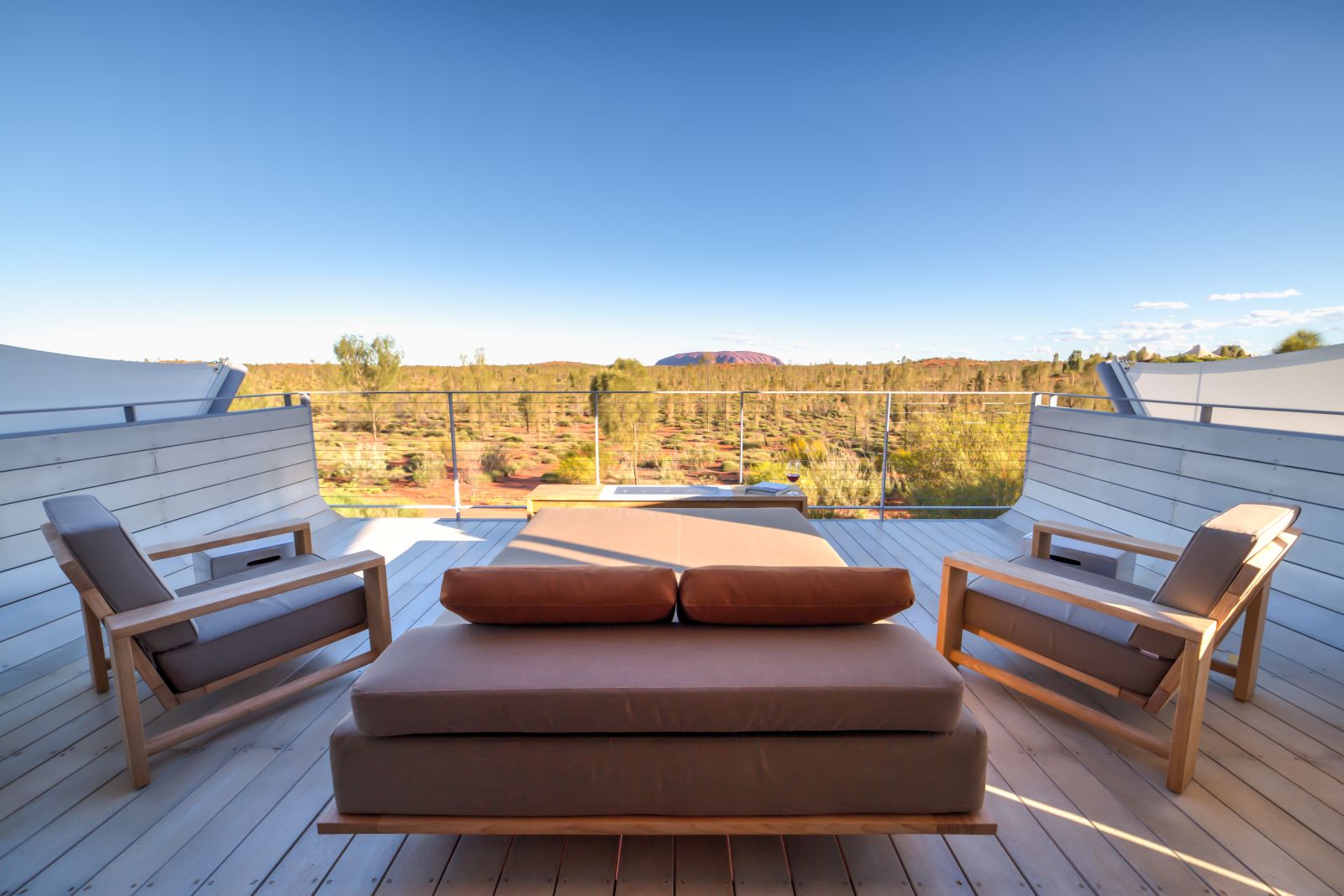 Ayers rock view from tent balcony at Longitude 131 camp in Australia