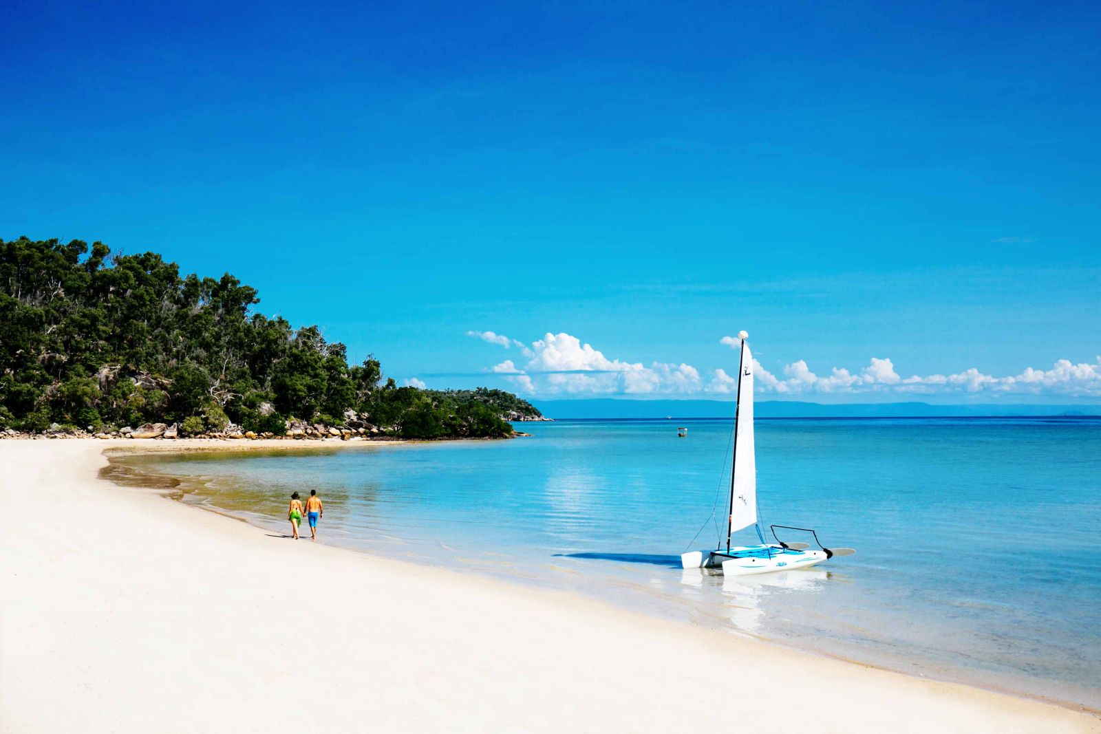 Catamaran and beach on Orpheus Island in Australia's Great Barrier Reef