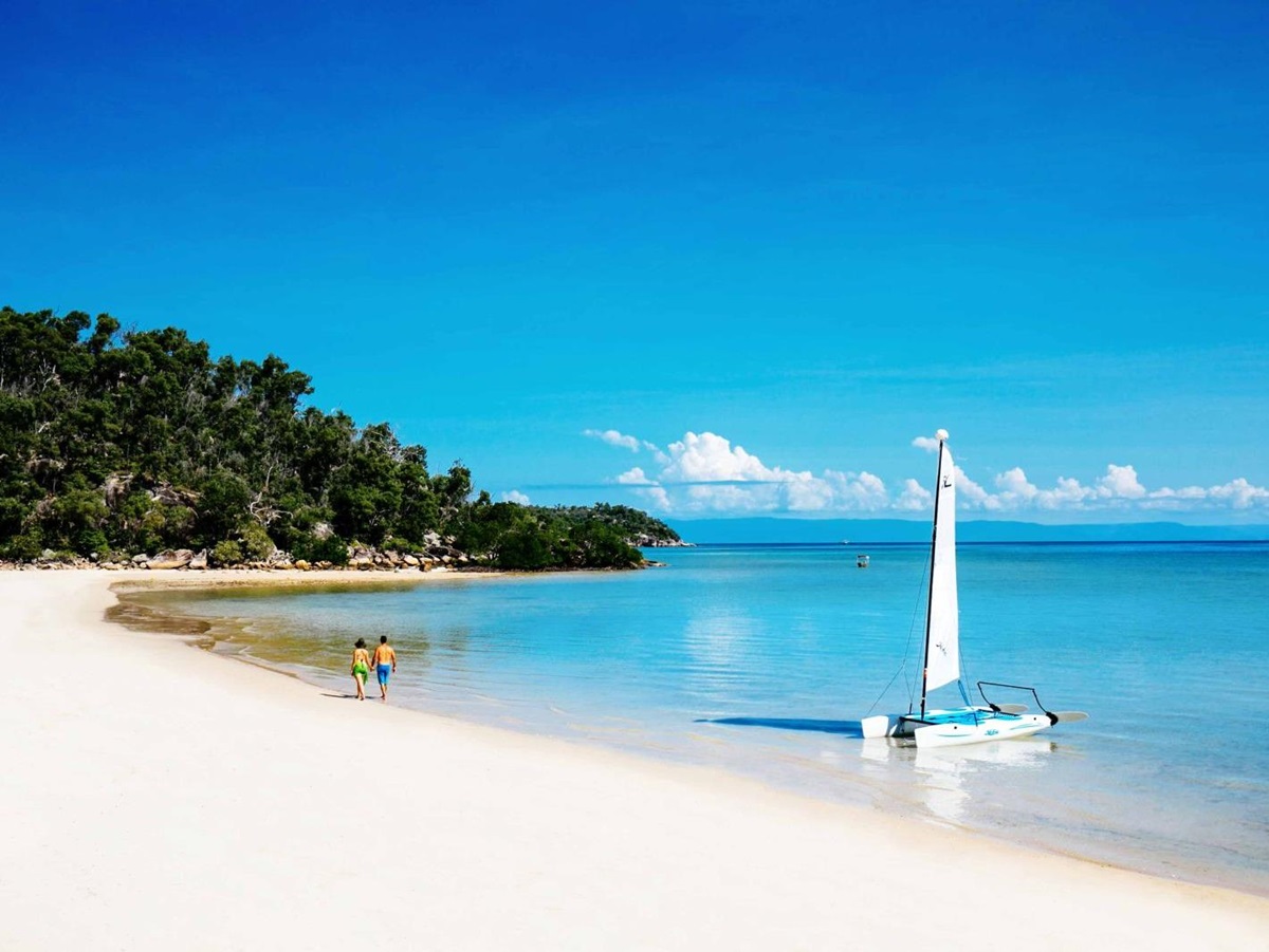 Catamaran and beach on Orpheus Island in Australia's Great Barrier Reef