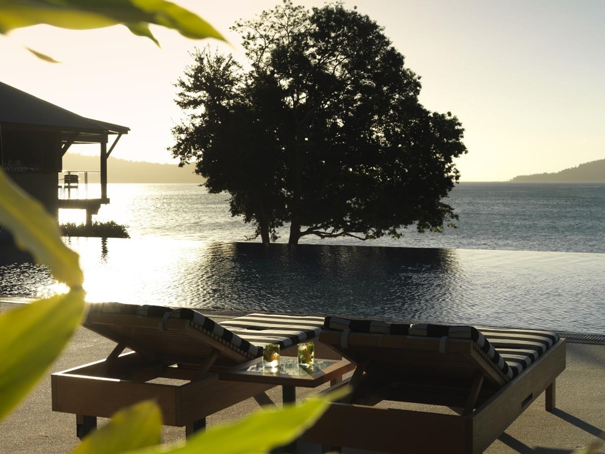 Pebble beach pool by the Great Barrier Reef at luxury lodge Qualia in Australia