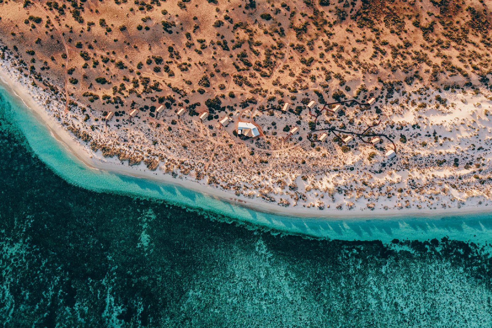 Aerial view of the camp and Ningaloo Reef at Sal Salis luxury camp in Western Australia