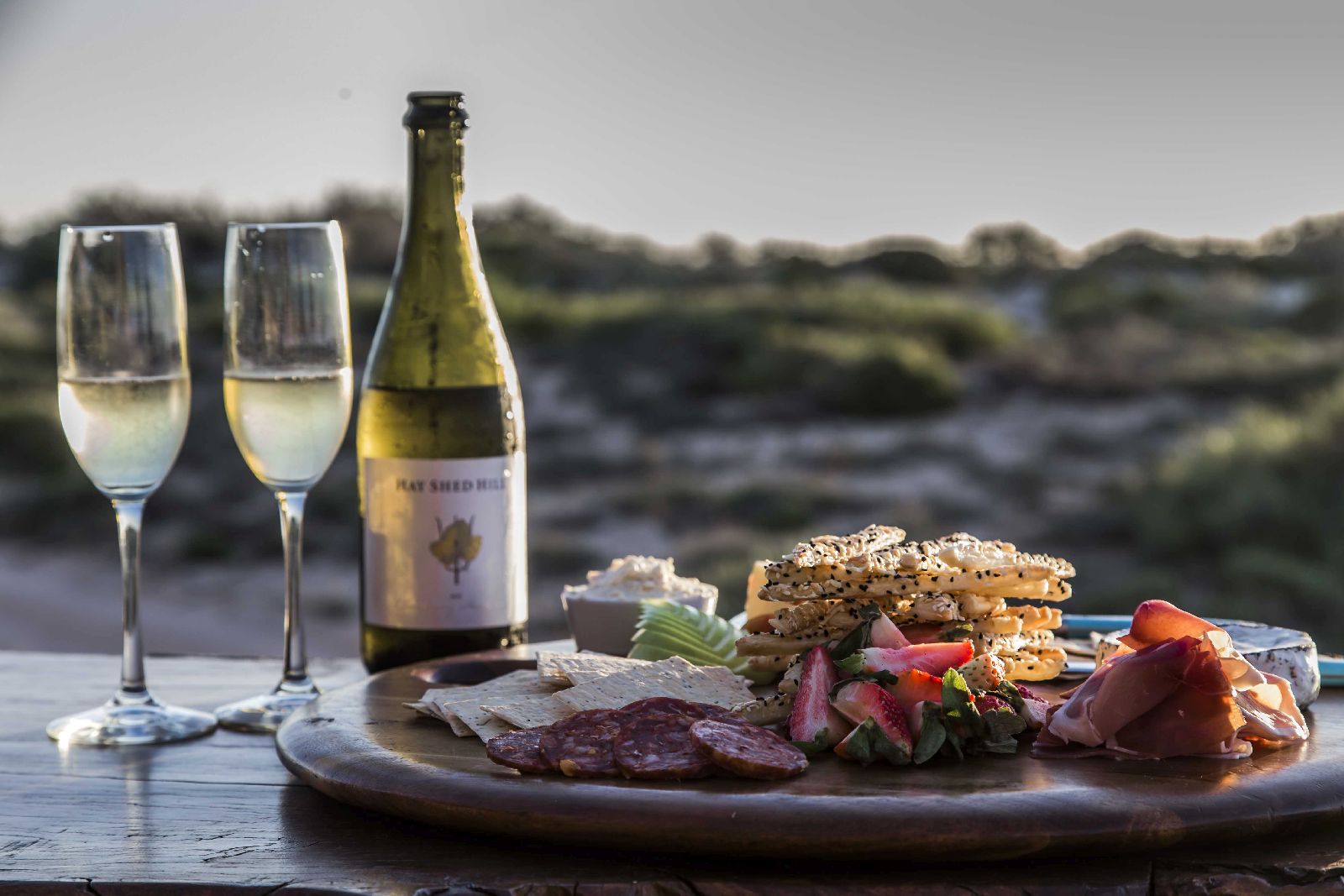 Evening wine and canapes at Sal Salis luxury camp in Western Australia