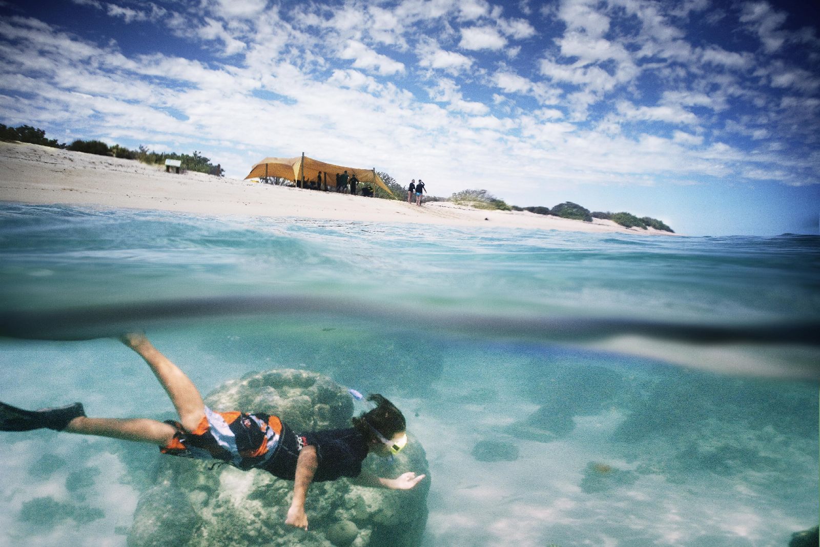 Snorkelling on the edge of the Ningaloo Reef from at Sal Salis luxury camp in Australia