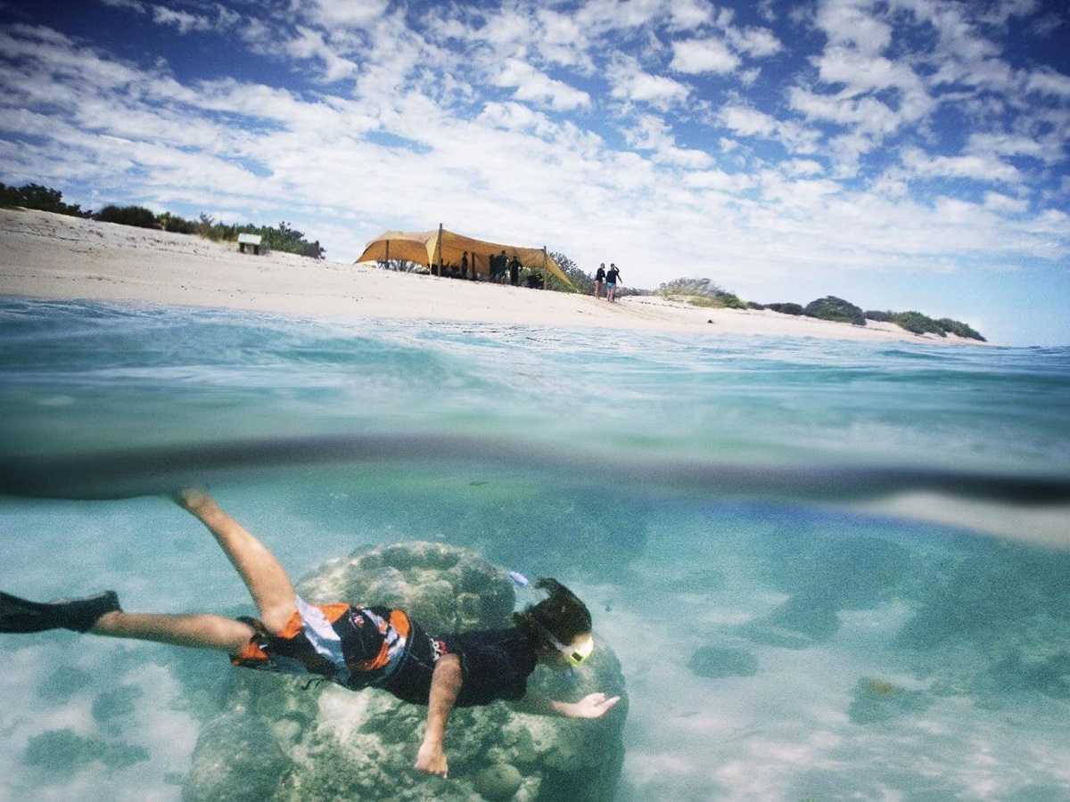 Snorkelling on the edge of the Ningaloo Reef from at Sal Salis luxury camp in Australia
