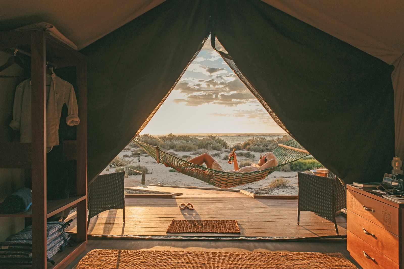 Guest enjoying their hammock at Sal Salis luxury camp in Western Australia