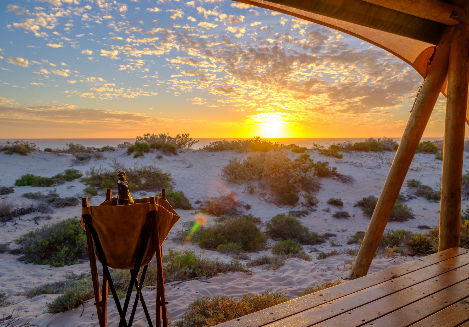 Sunset on the terrace at Sal Salis luxury camp in Western Australia