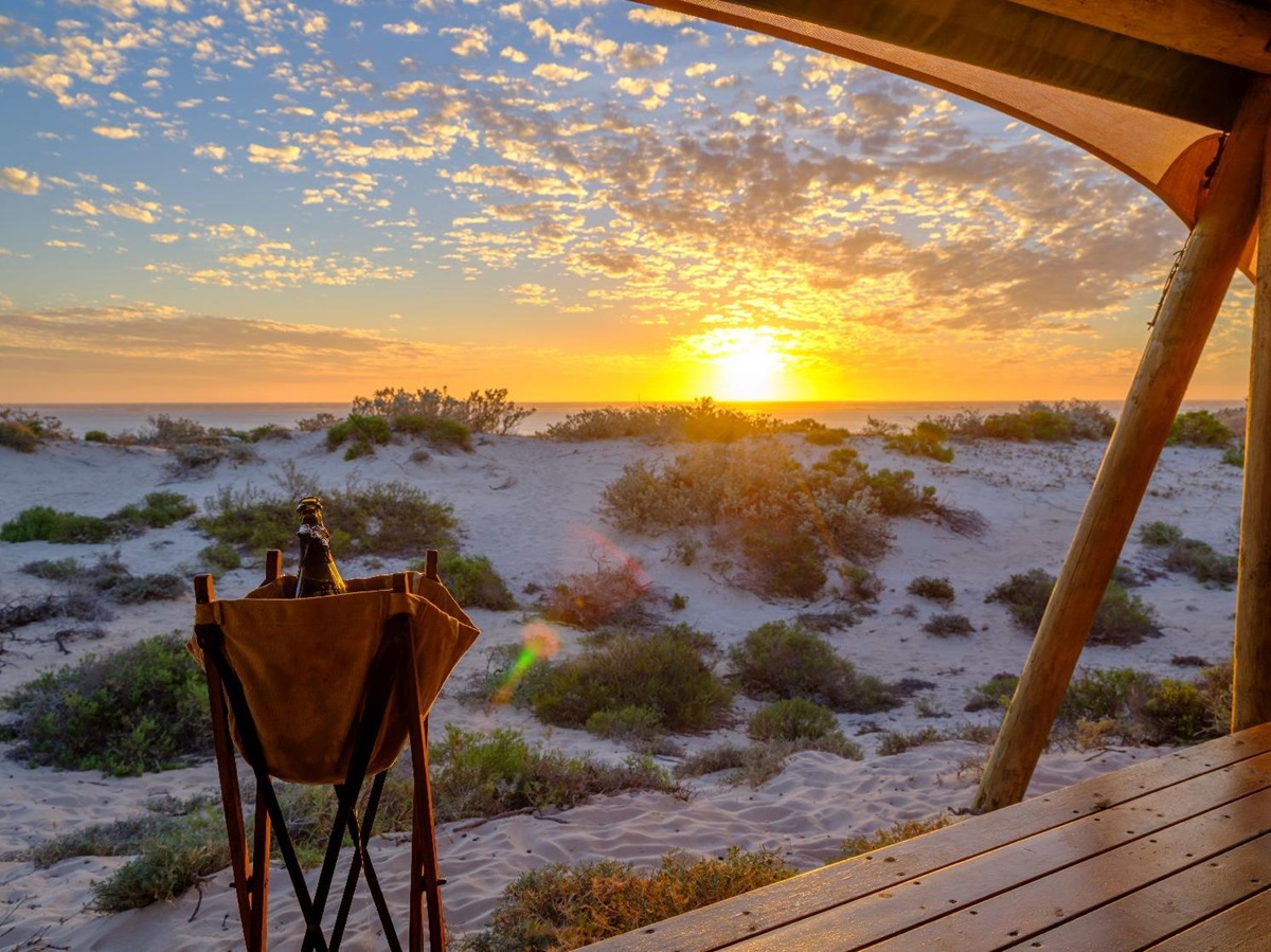 Sunset on the terrace at Sal Salis luxury camp in Western Australia