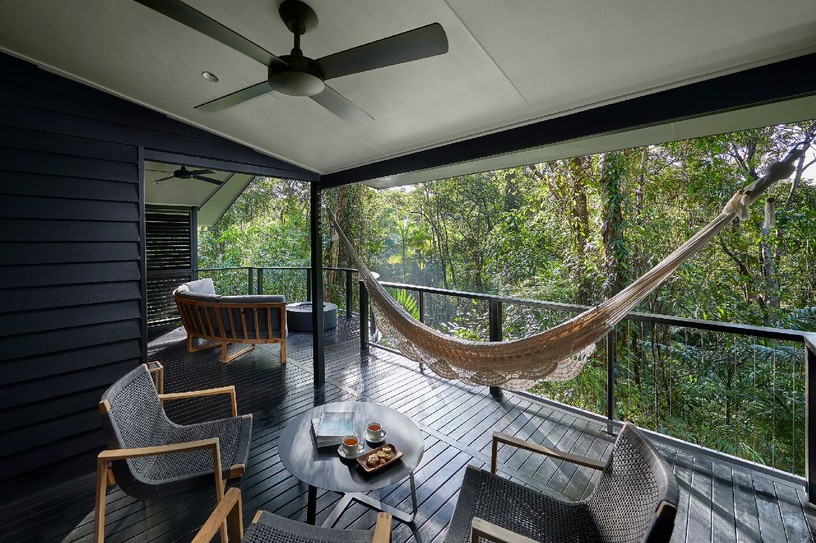 Private balcony and hammock of a Billabong Suite at Silky Oaks Daintree Australia