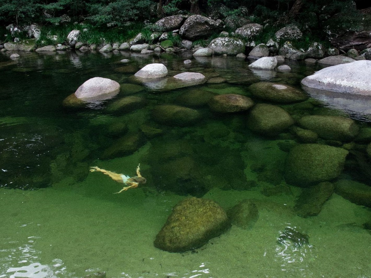 Swimming in Mossman Gorge from Silky Oaks Daintree Australia