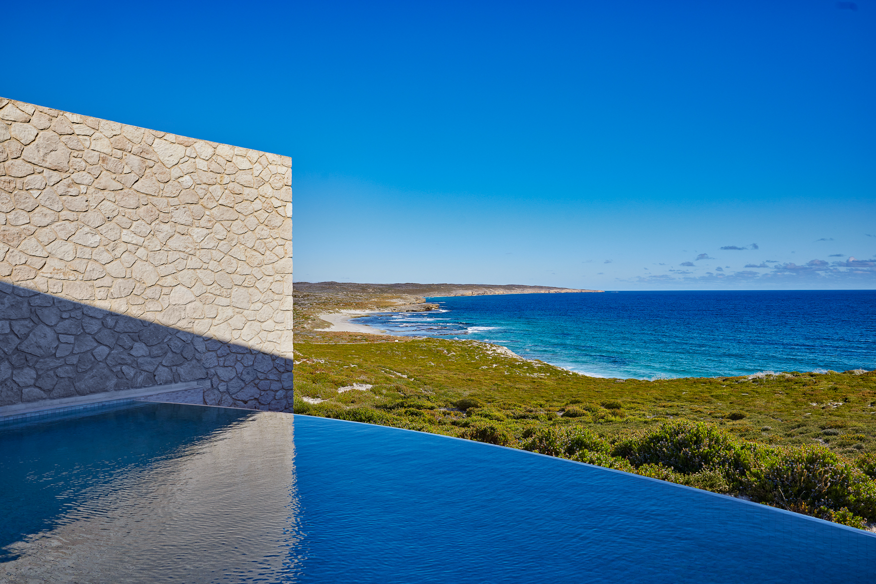 Main swimming pool overlooking the coast at Southern Ocean Lodge