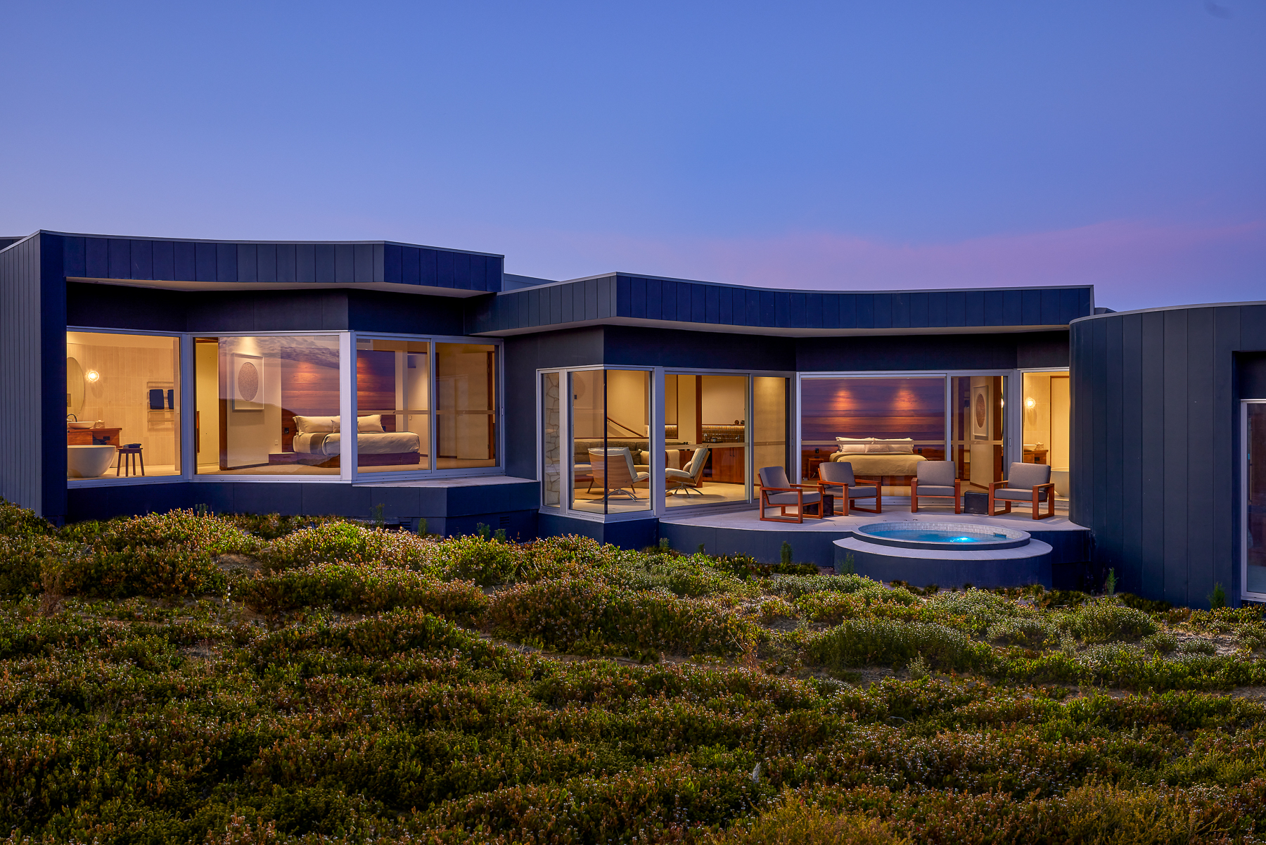 Exterior view of a guest suite and private pool at Southern Ocean Lodge