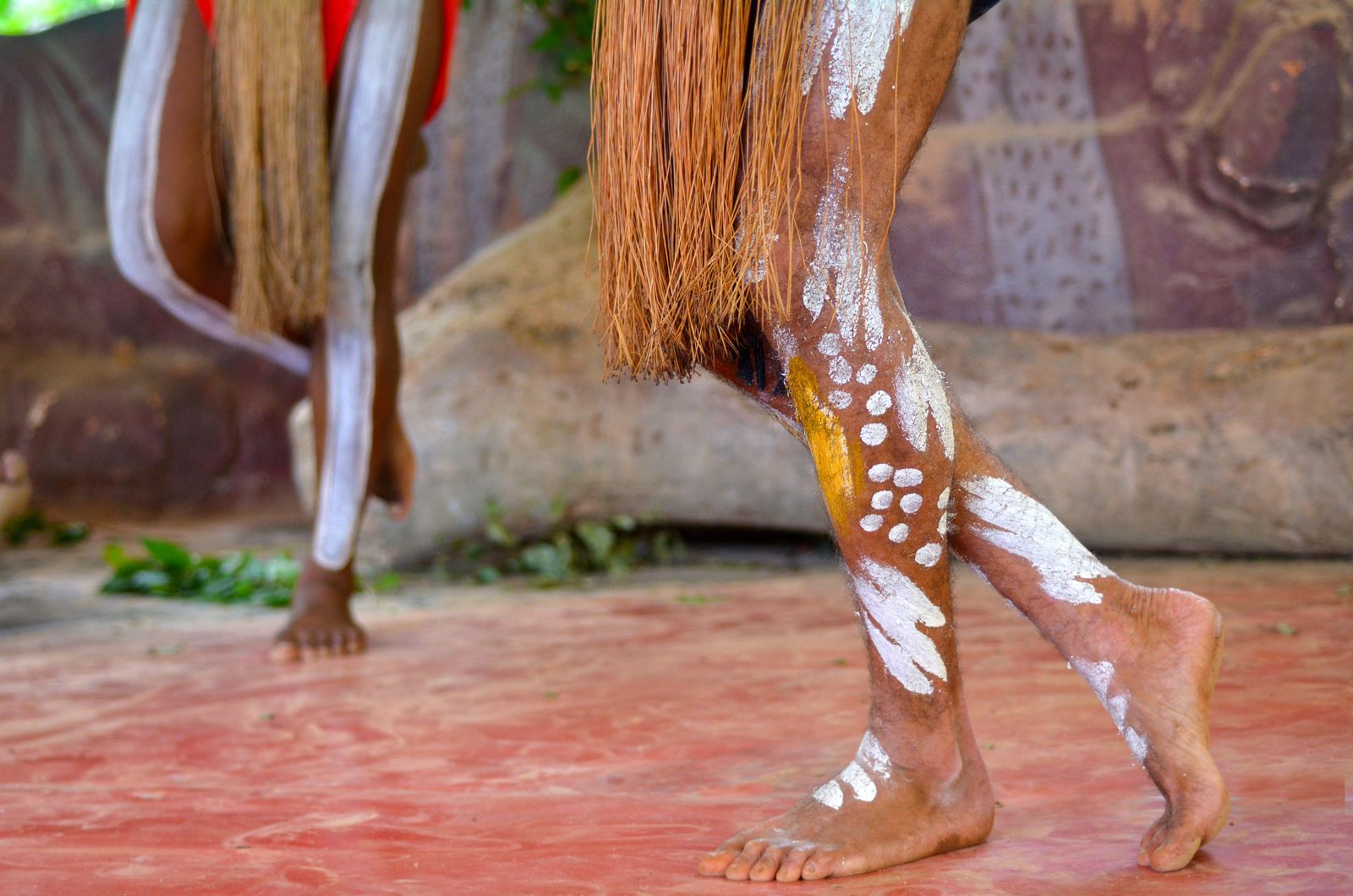 Aboriginal Australians dancing in traditional costume