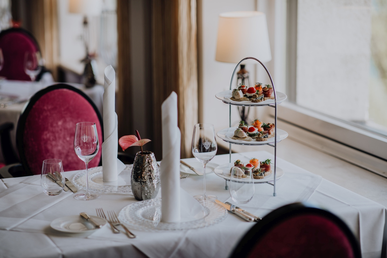 Dining at the restaurant of luxury hotel Schluss Fuschl in Austria
