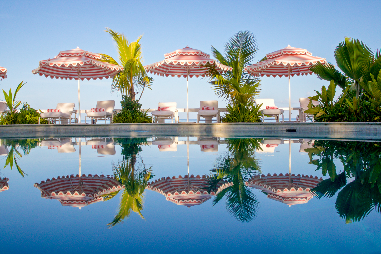 Swimming pool and sun loungers at Cobbler's Cove resort in Barbados