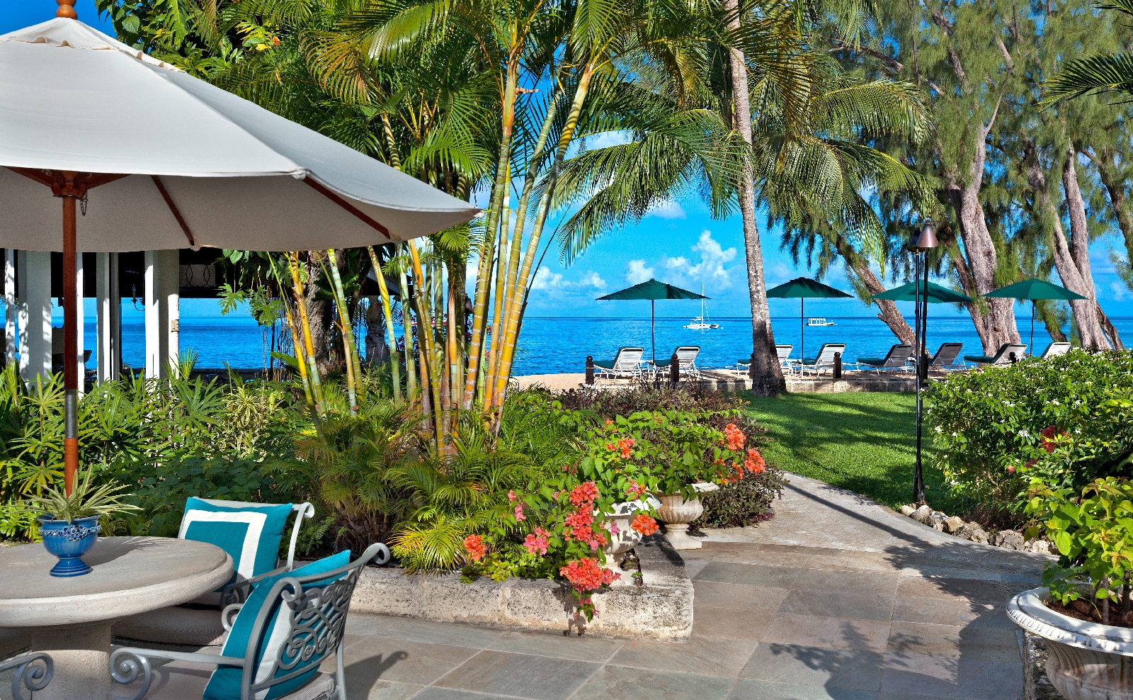 a terrace with beach access at coral reef club, barbados