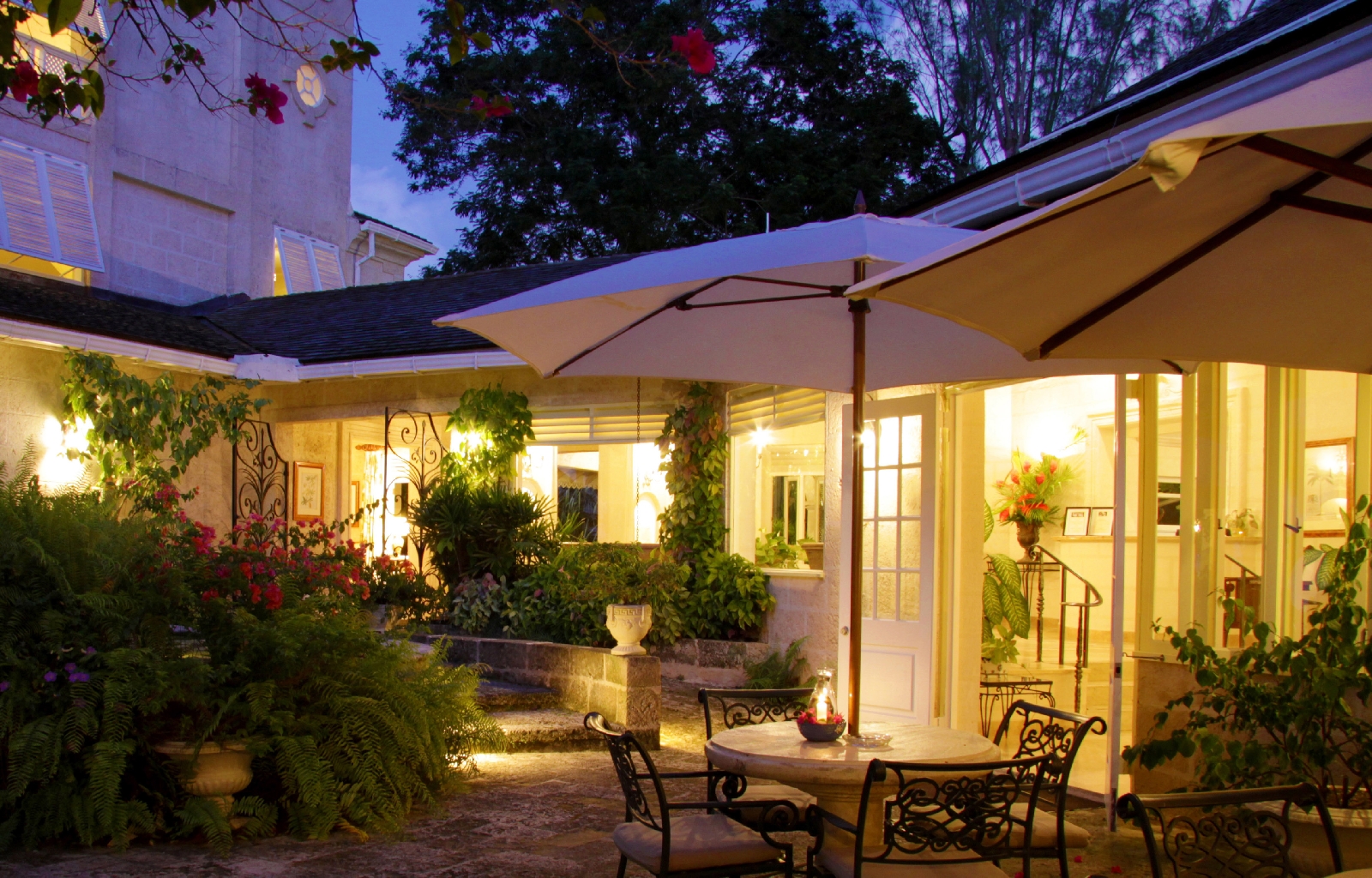 a terrace at night at coral reef club, barbados