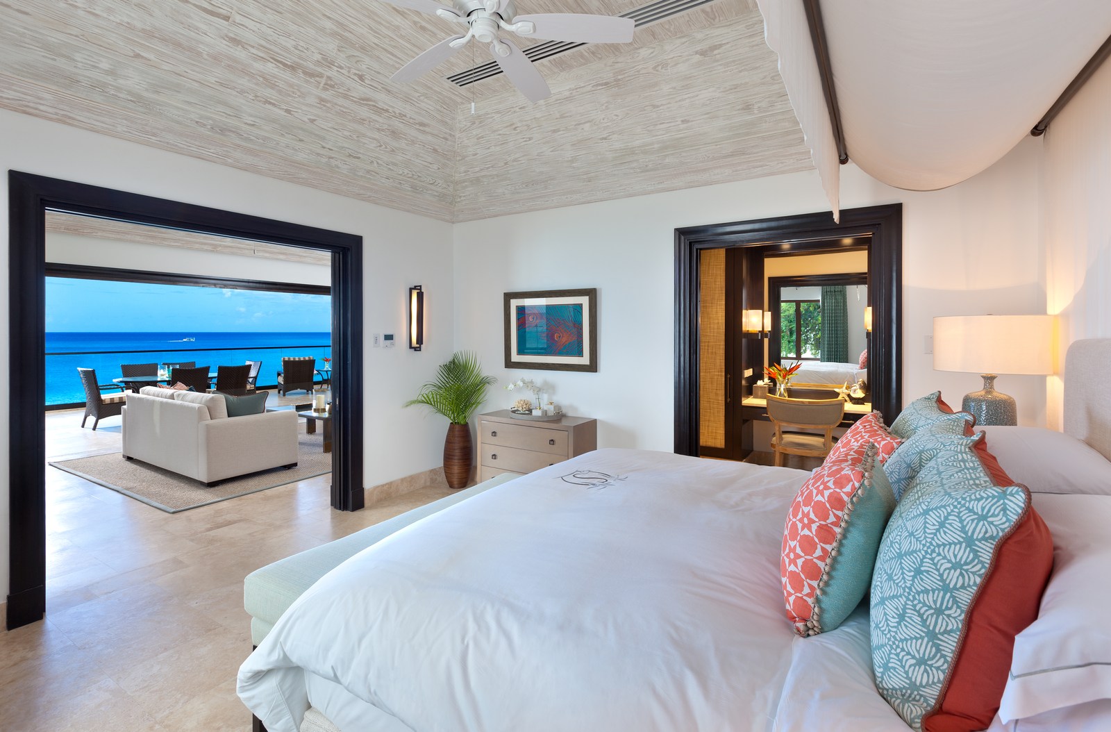 A double bedroom with terrace access at Sandpiper, Barbados