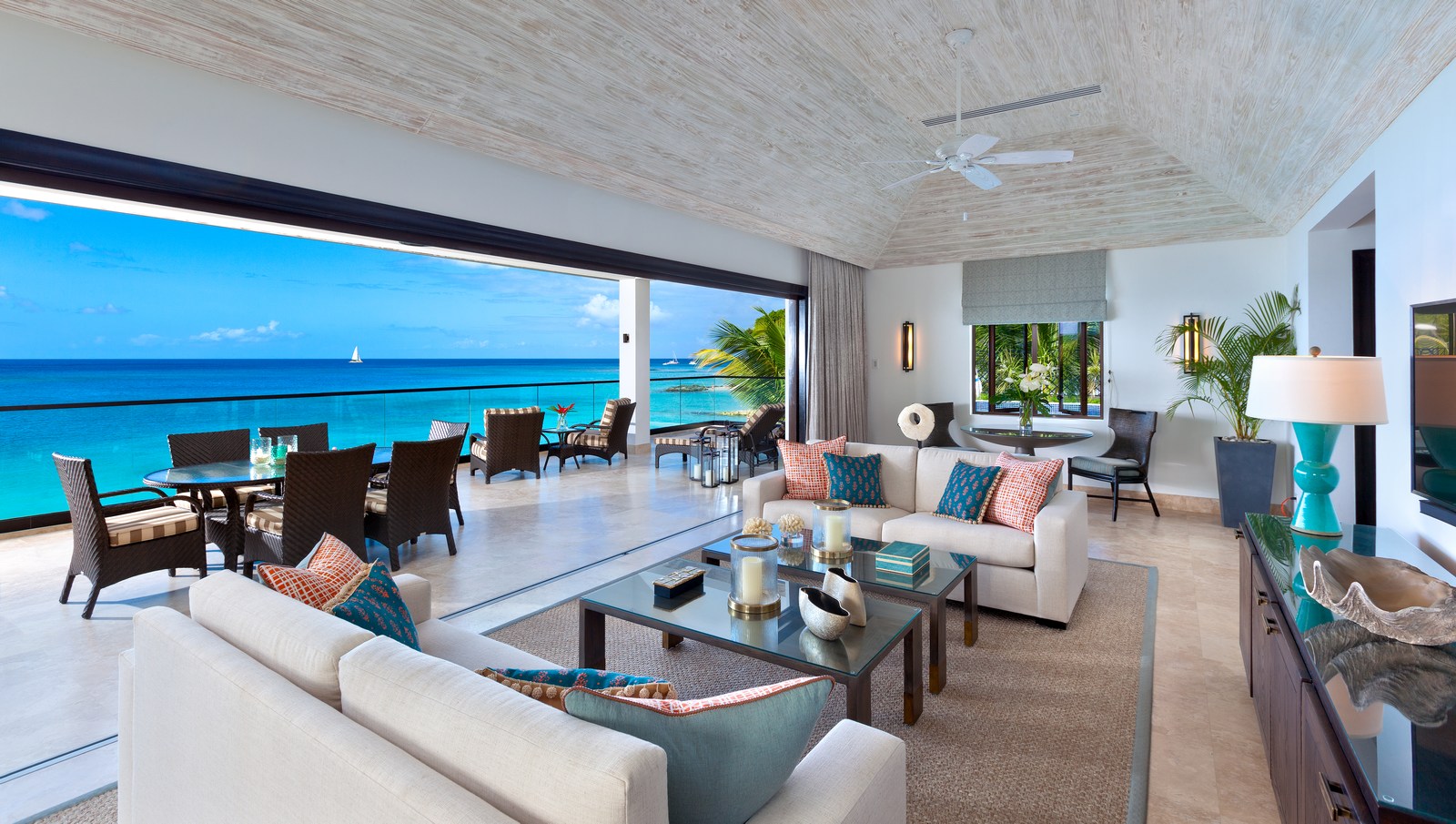 Living room and terrace ofo a suite at Sandpiper, Barbados
