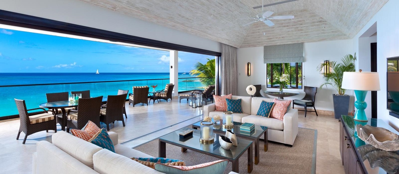 Living room and terrace ofo a suite at Sandpiper, Barbados