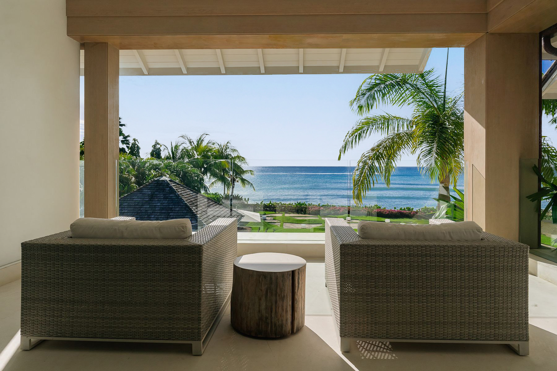 Balcony of bedroom with view of the sea at Godings Beach House in Barbados