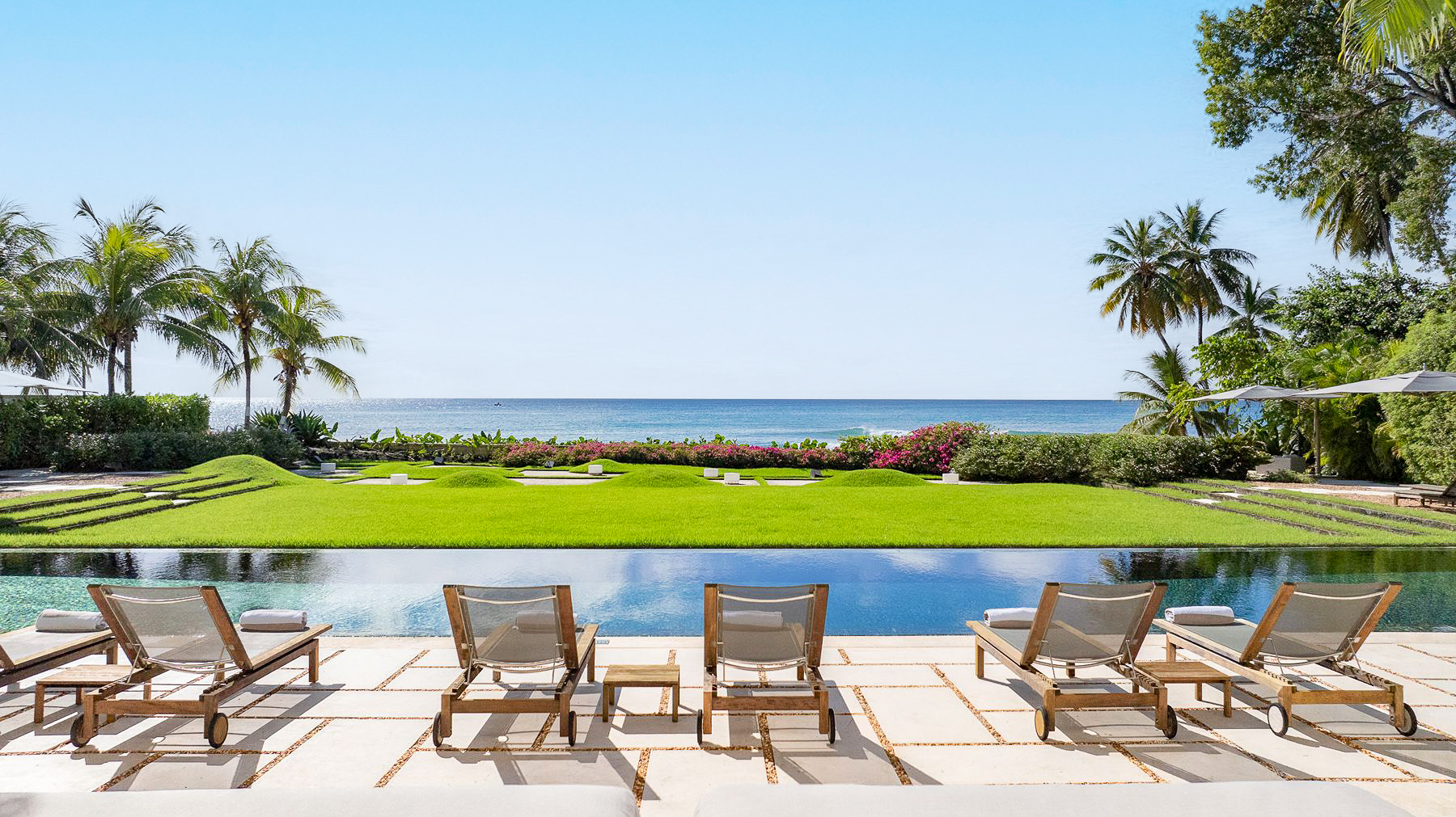 Pool with view of the sea at Godings Beach House in Barbados