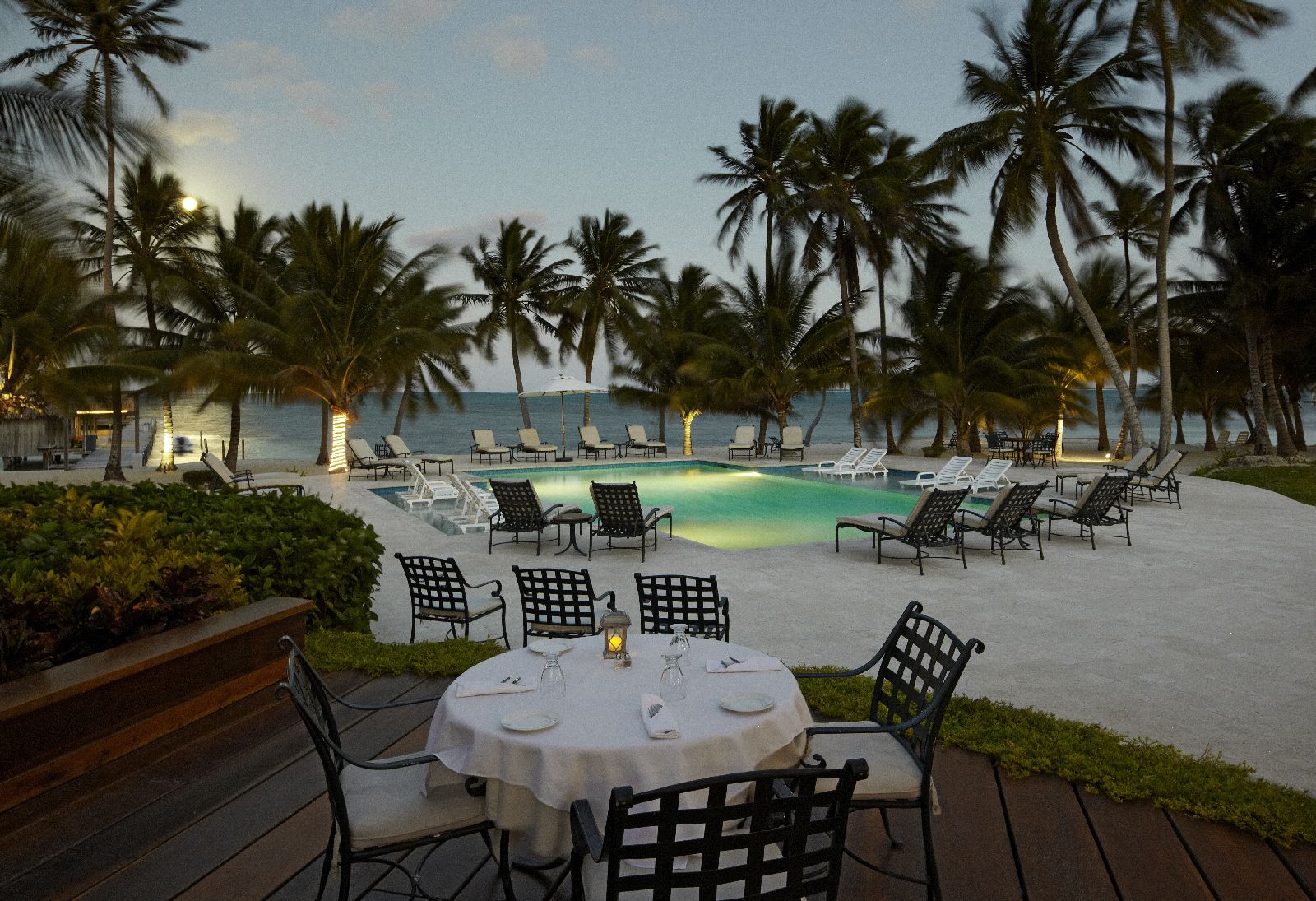 Poolside dining at Victoria House resort on Ambergris Caye Belize