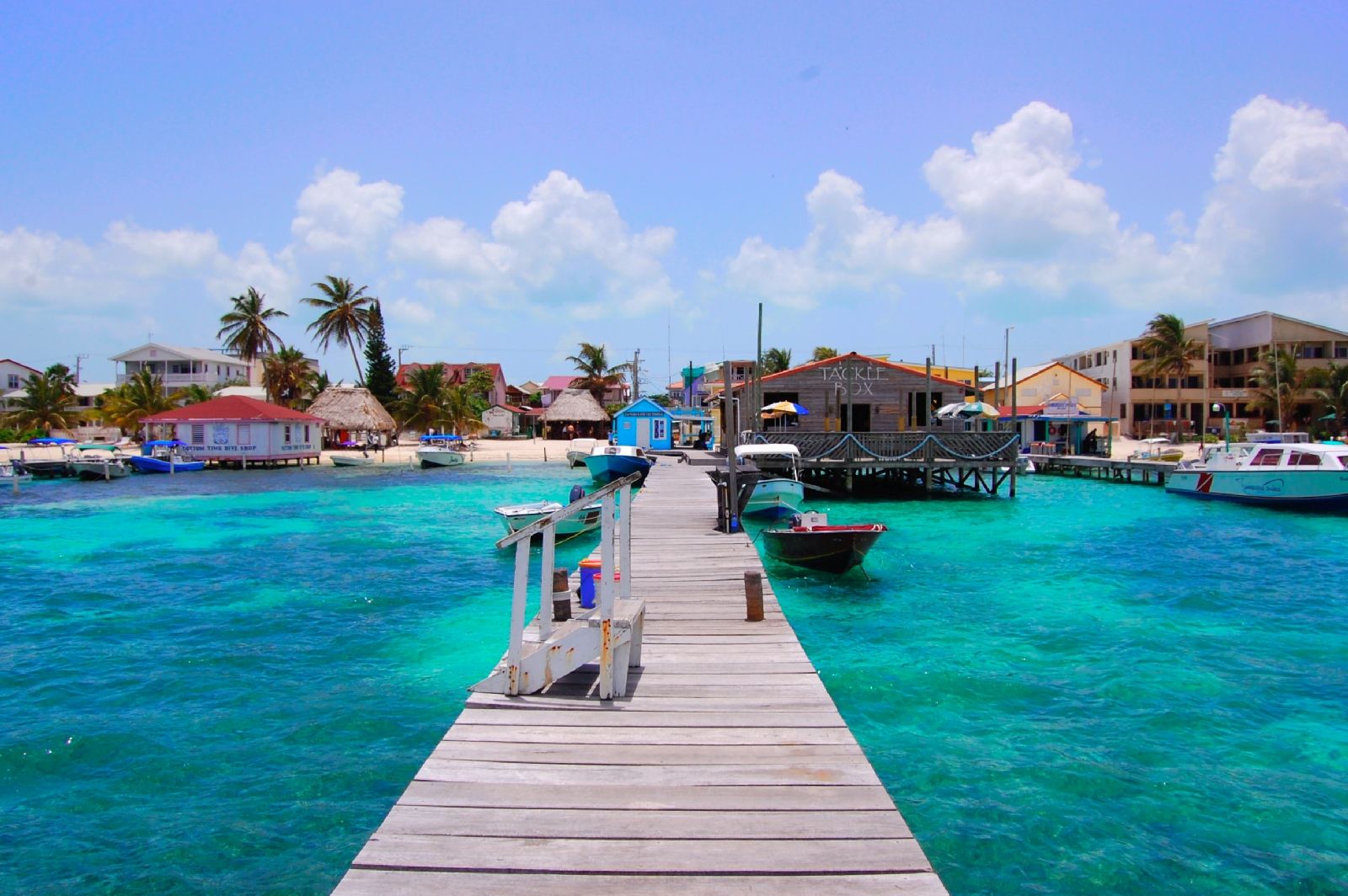 Pier and the lively town of San Pedro on Ambergris Caye in Belize