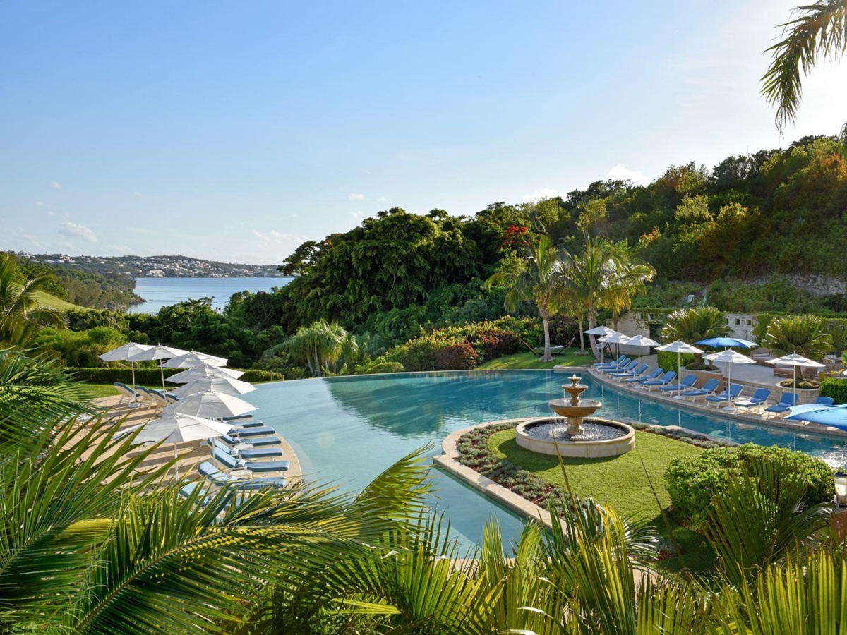 The swimming pool and grounds at the Rosewood Bermuda