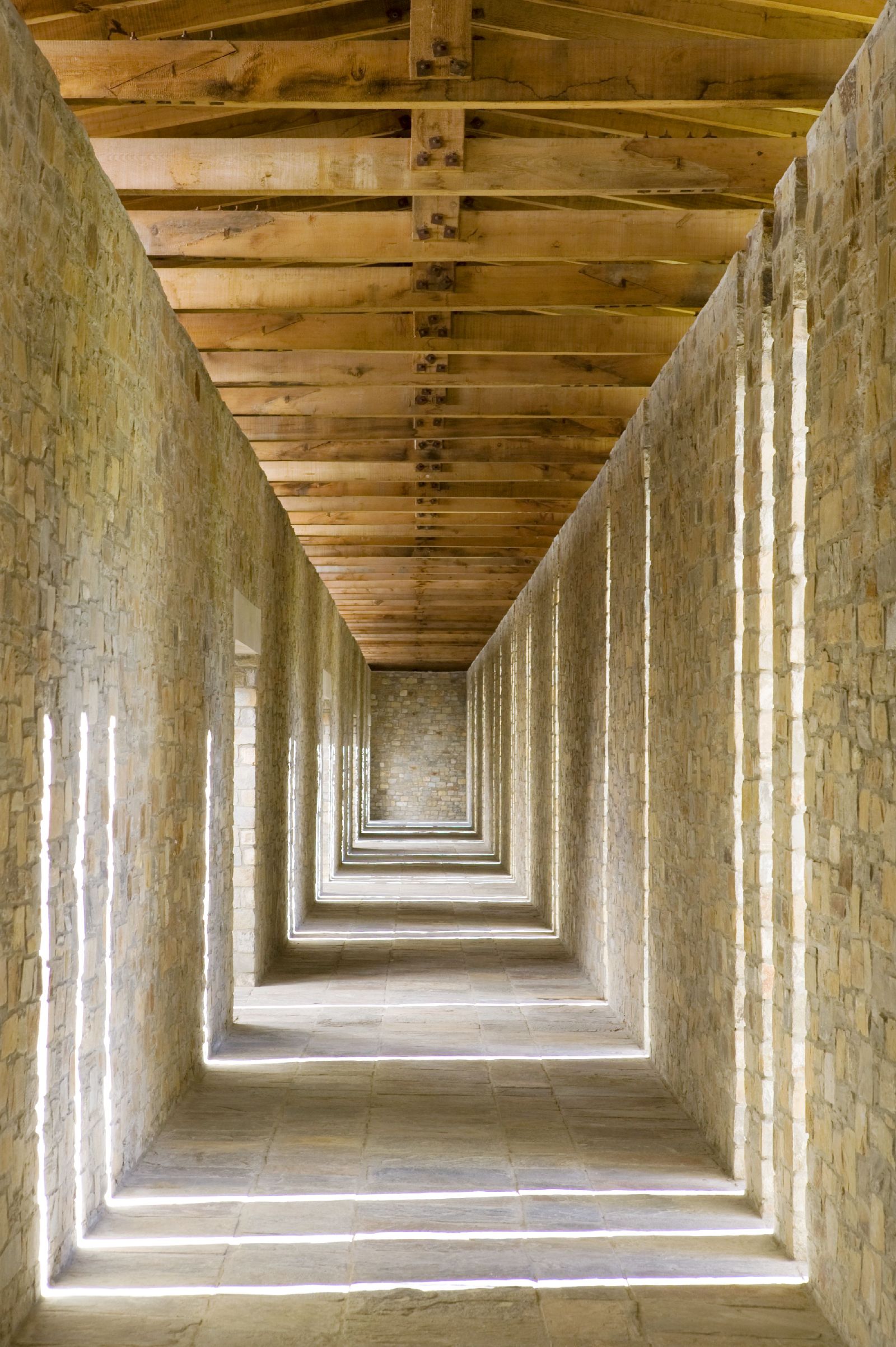Stone corridors leading to the suites at Amankora Bumthang in Bhutan