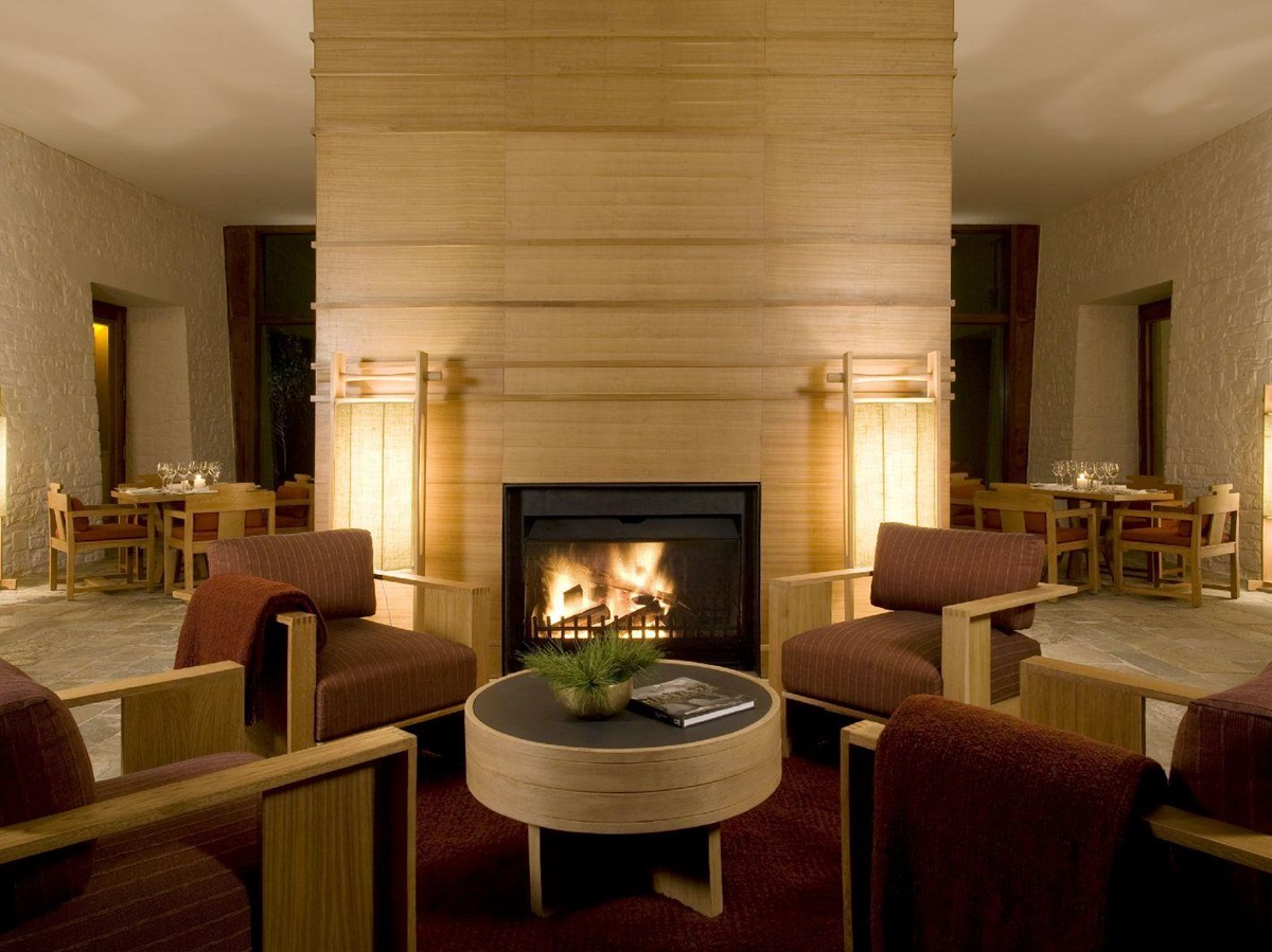 Cosy lounge and fireplace at the Amankora Bumthang lodge in Bhutan