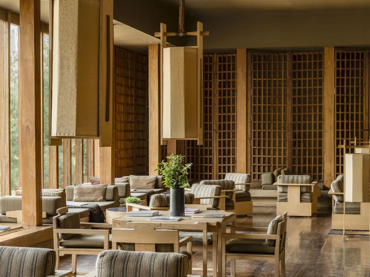 Natural wood ascents fill the minimalistic style living room area at luxury hotel Amankora Paro in Bhutan