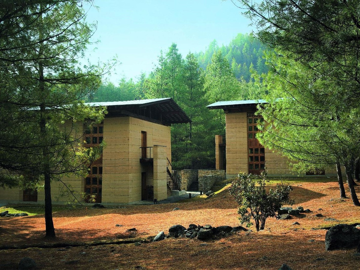 Forest exterior view of suites at luxury hotel Amankora Paro in Bhutan