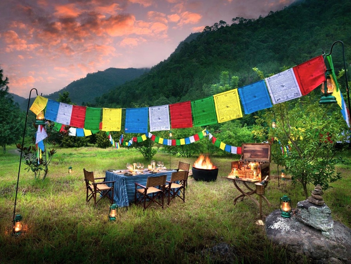 Alfresco dining on the grounds of &Beyond Punakha River Lodge in Bhutan