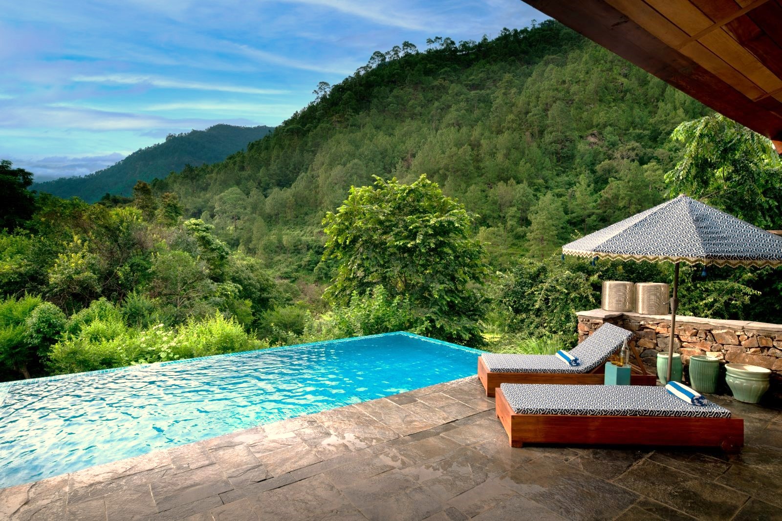 Family suite swimming pool at &Beyond Punakha River Lodge in Bhutan