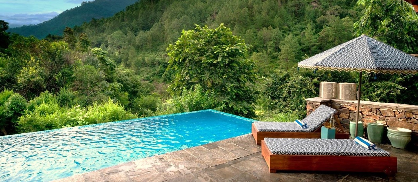 Family suite swimming pool at &Beyond Punakha River Lodge in Bhutan