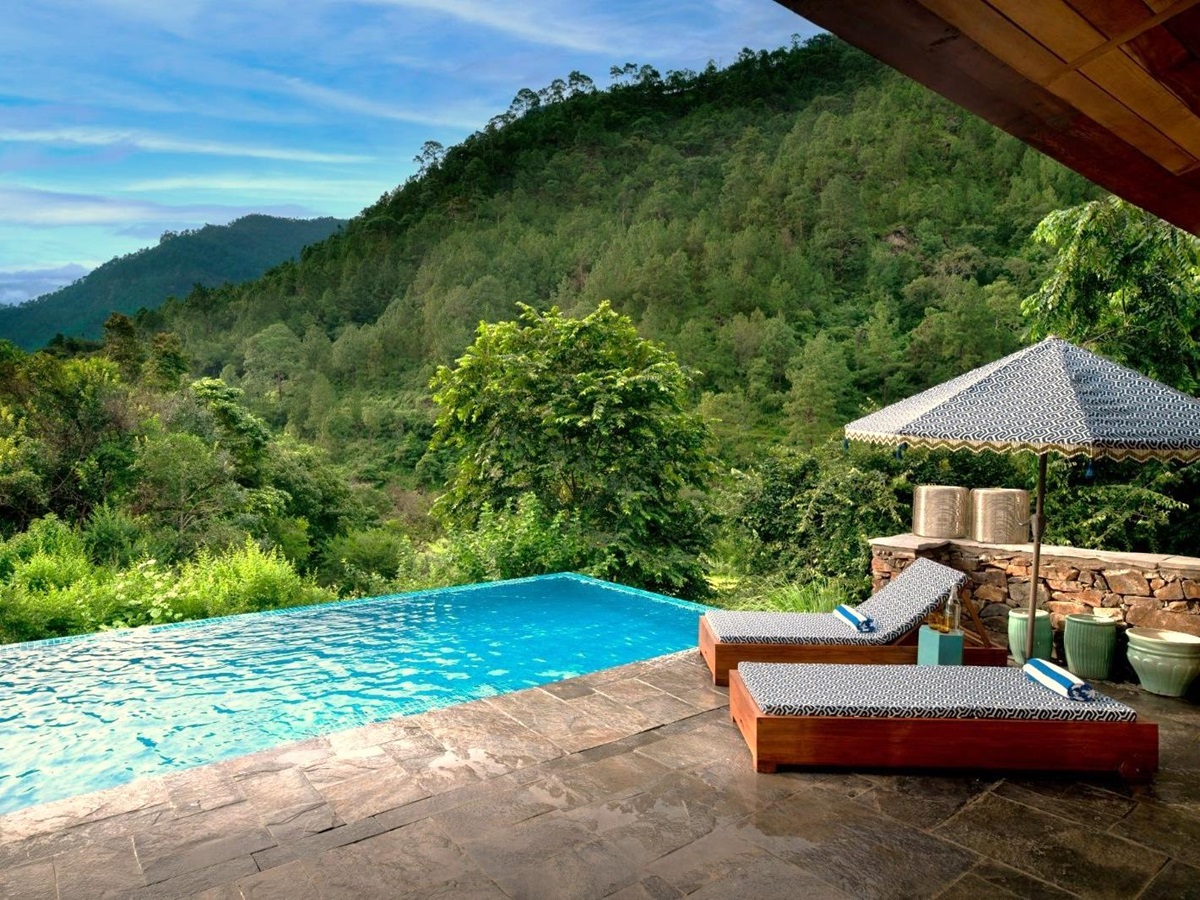 Family suite swimming pool at &Beyond Punakha River Lodge in Bhutan