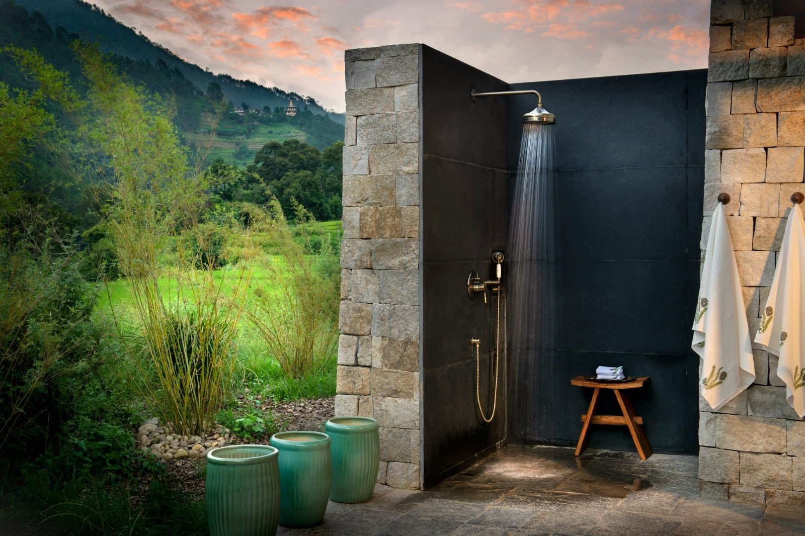 Outdoor shower at &Beyond Punakha River Lodge in Bhutan