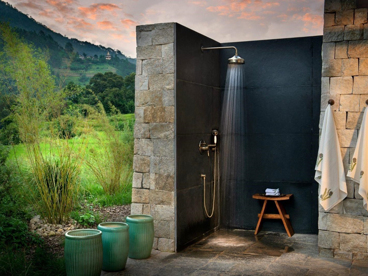 Outdoor shower at &Beyond Punakha River Lodge in Bhutan