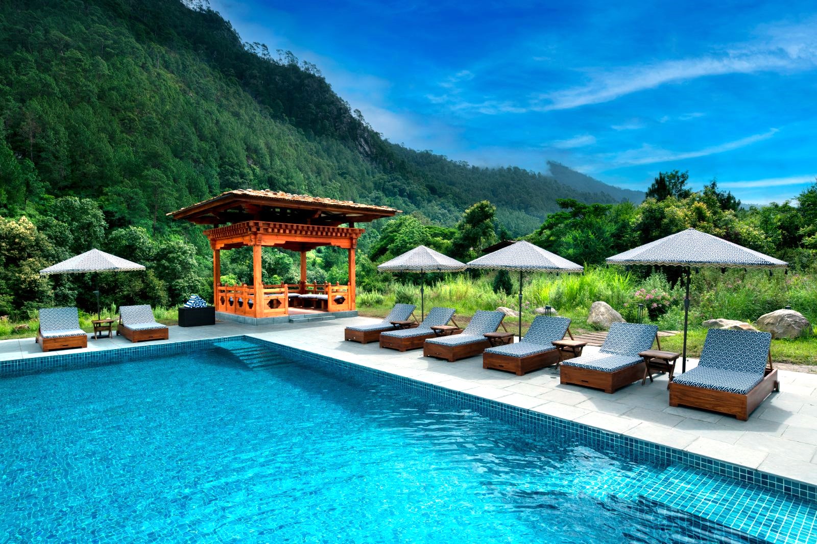 Swimming pool at &Beyond Punakha River Lodge in Bhutan