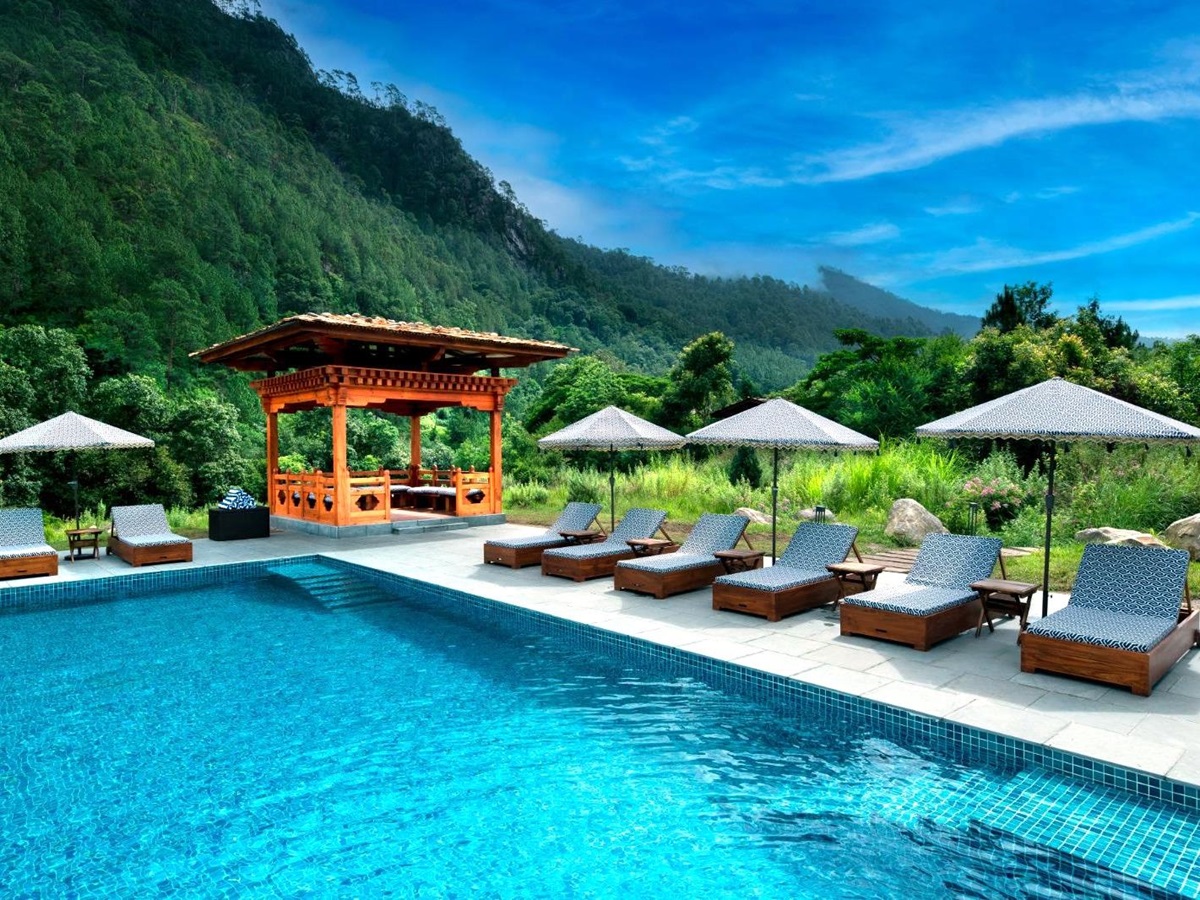 Swimming pool at &Beyond Punakha River Lodge in Bhutan