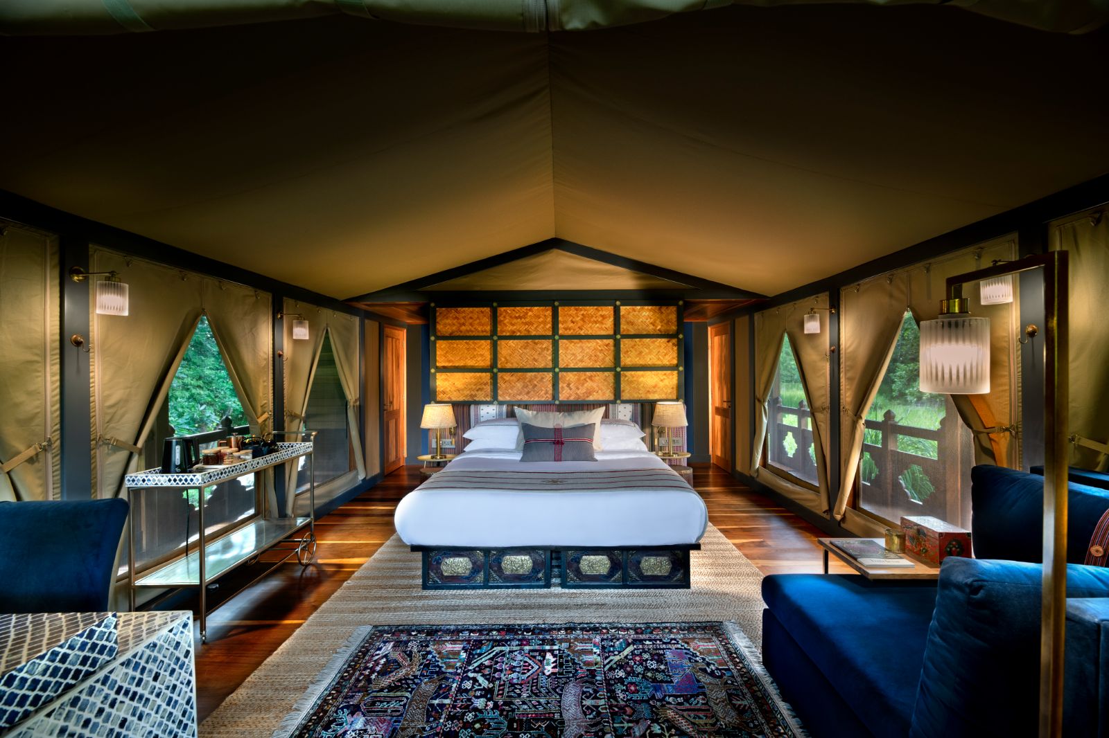 Tented suite bed at &Beyond Punakha River Lodge in Bhutan