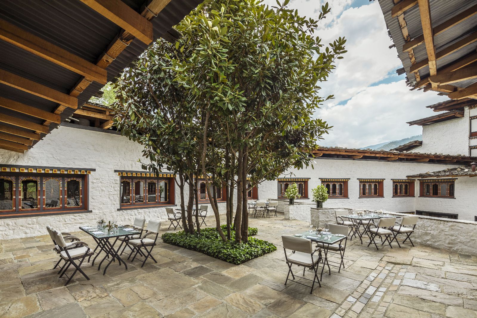 Outdoor seating in the courtyard at the COMO Uma Paro Bhutan