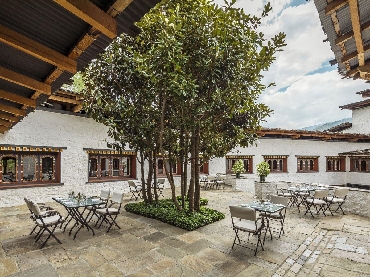 Outdoor seating in the courtyard at the COMO Uma Paro Bhutan