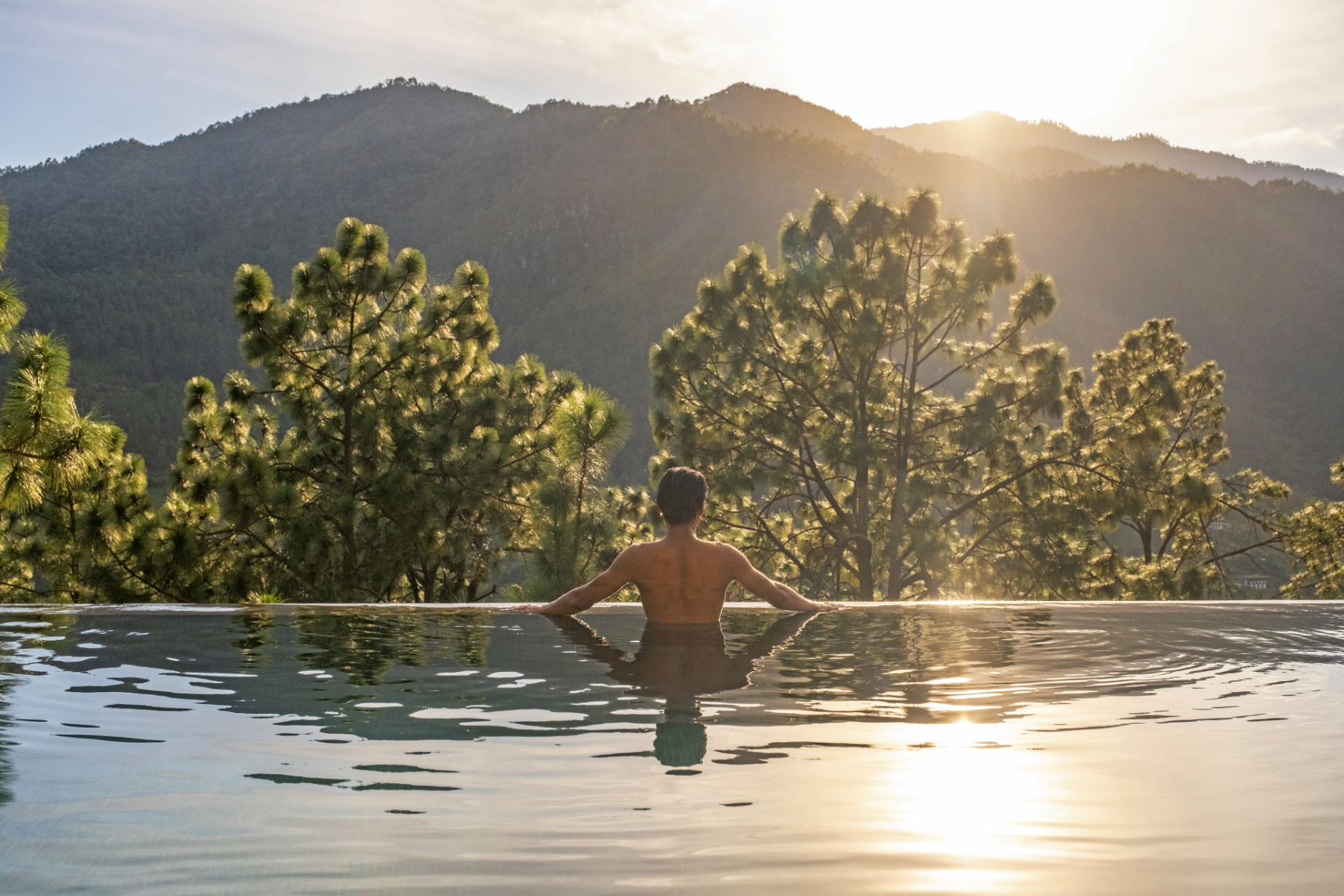 View from the swimming pool at Pemako Punakha luxury hotel in Bhutan