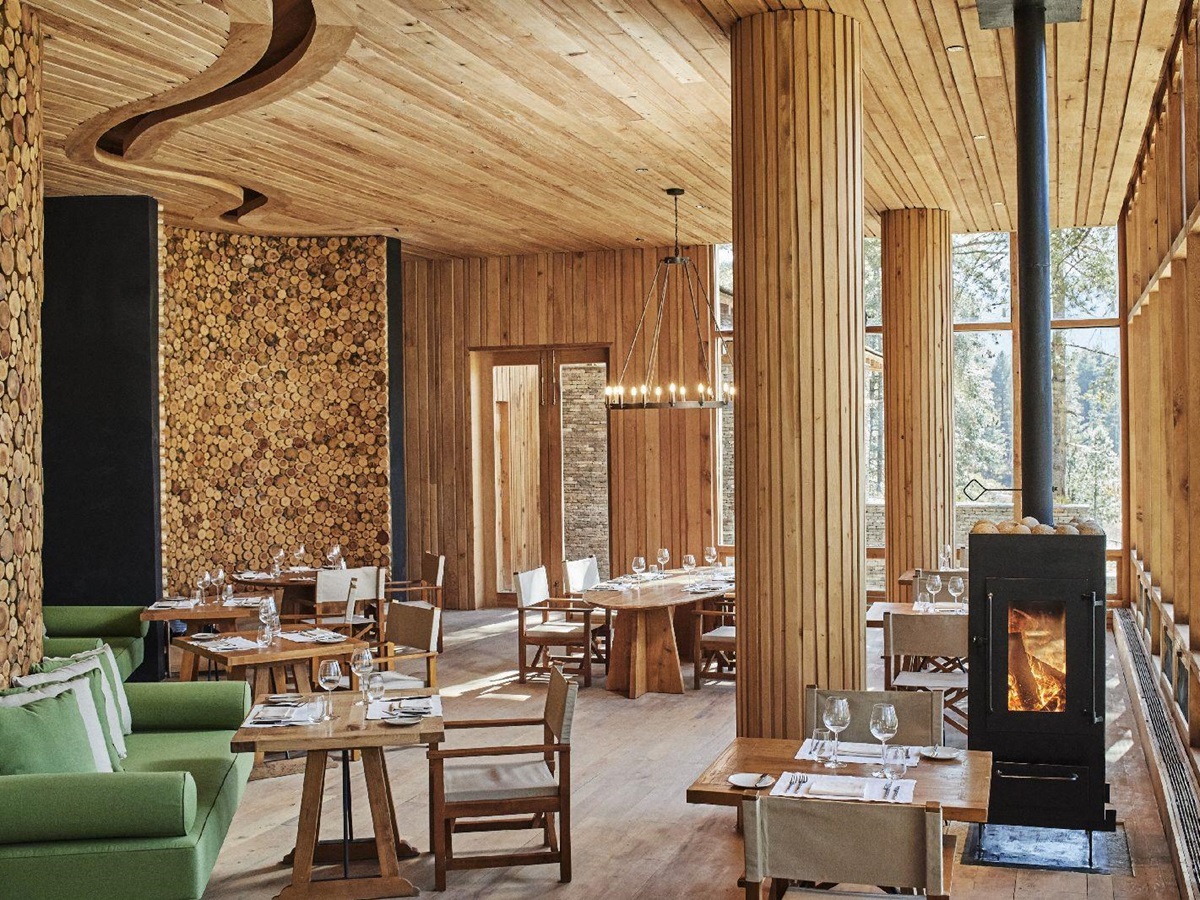The cosy lounge and restaurant at Six Senses Bumthang in Bhutan