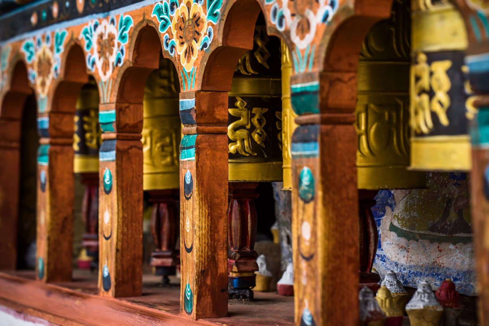 Colourful orange and yellow prayer wheel