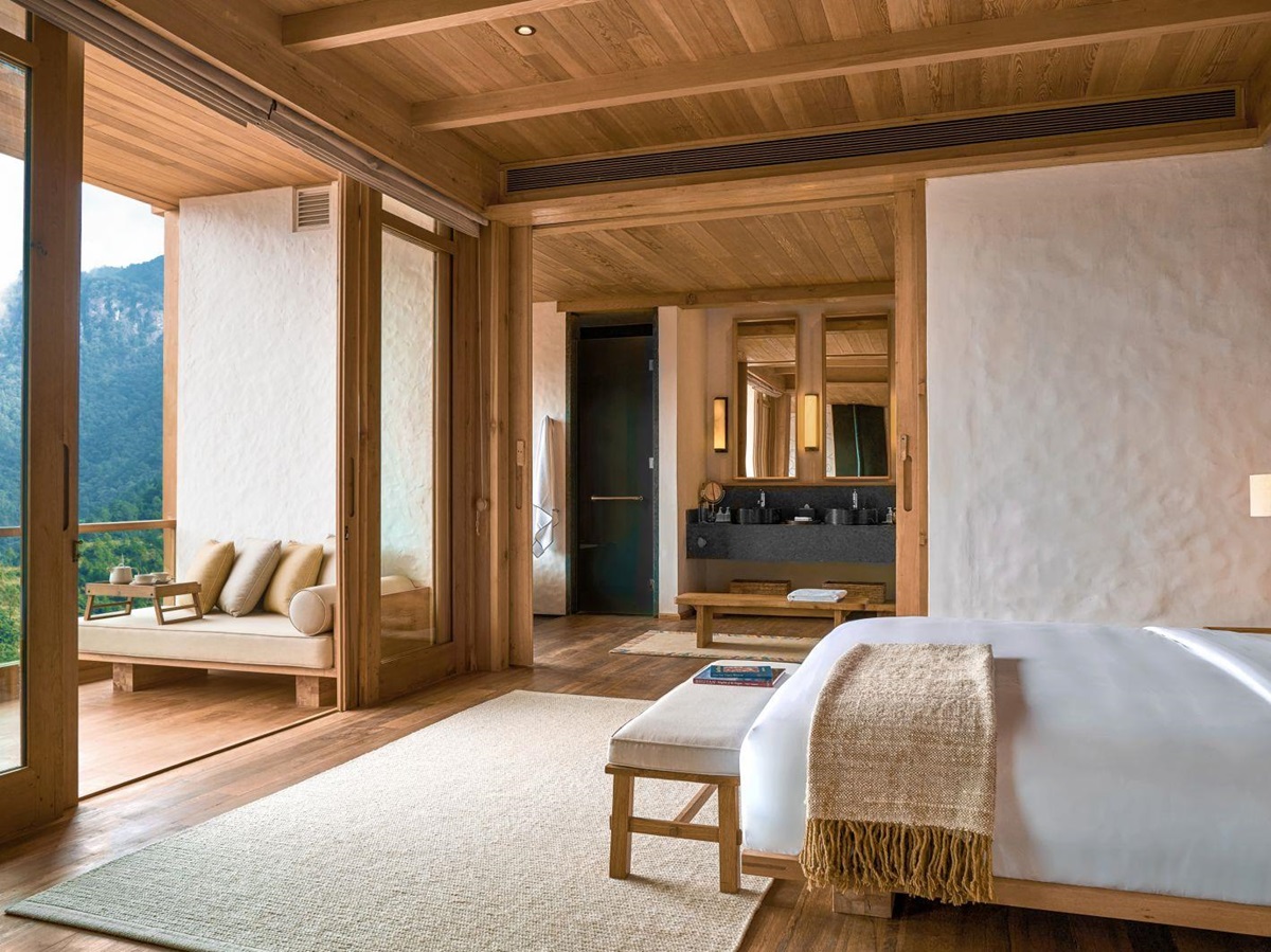 Master bedroom at Lodge Suite with balcony at Six Senses Thimpu
