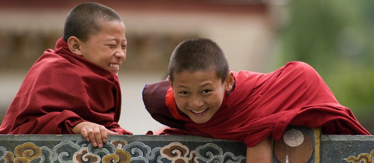 Smiling young monks in Bhutan