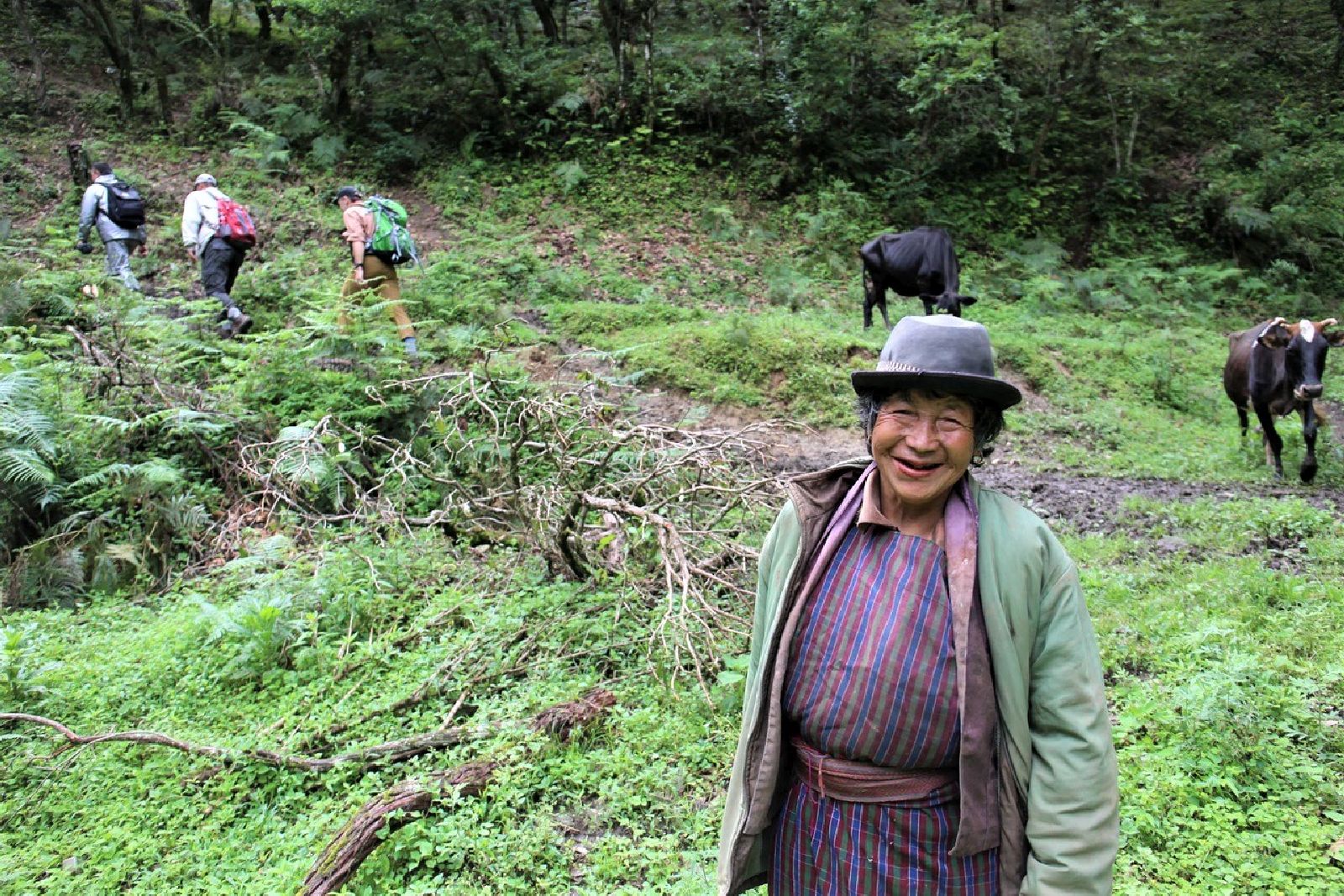 Smiling lady in rural farming community on the Trans-Bhutan Trail