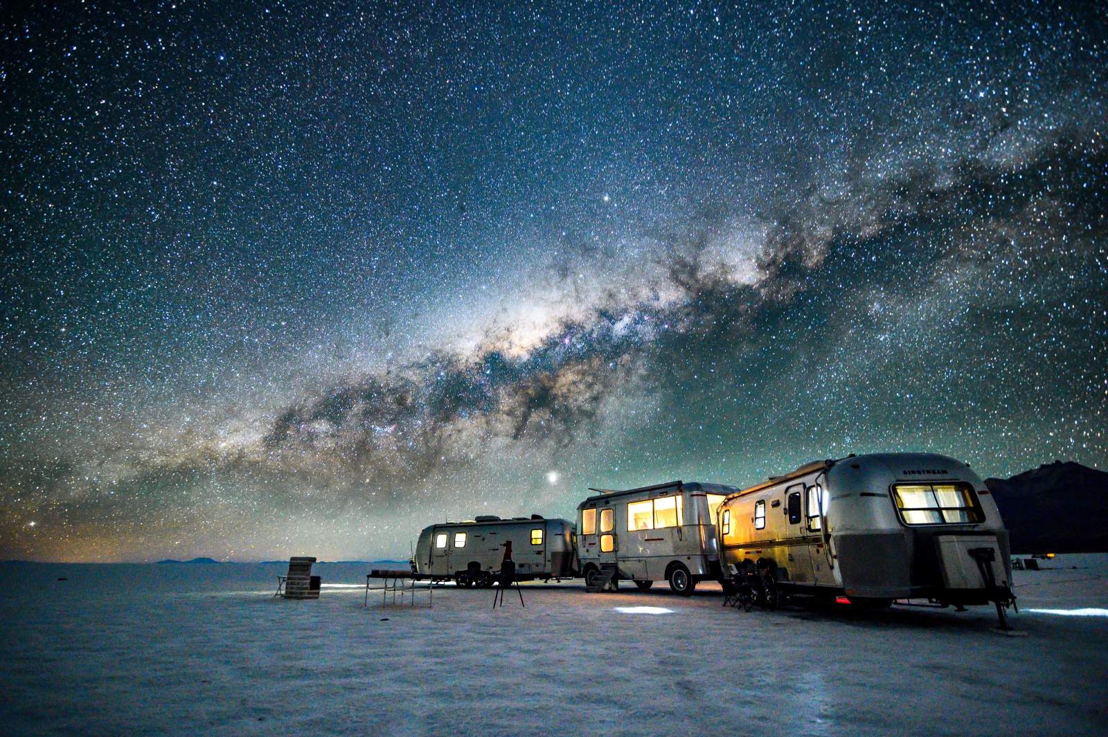 Night sky of Deluxe Airstream Camper in Bolivia Salt Flats